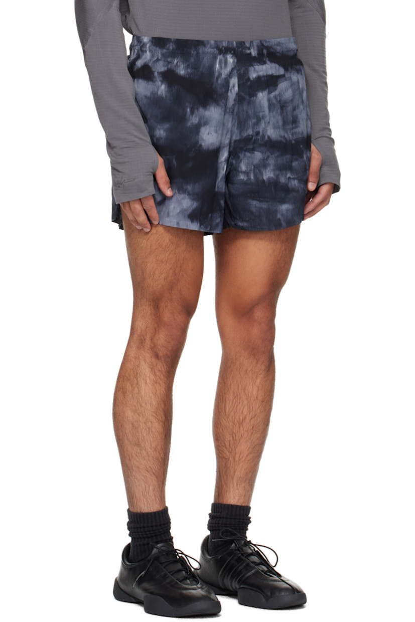 Stretch nylon seersucker shorts.

· Graphic pattern printed throughout
· Concealed drawstring at elasticized waistband
· Three-pocket styling
· Reflective logo printed at front
· Vented cuffs
· Briefs-style jersey lining

Supplier color: Black/Multicolor