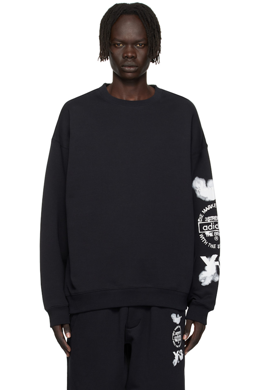 Cotton French terry sweatshirt.

· Rib-knit crewneck, hem, and cuffs
· Dropped shoulders
· Logo and text printed at sleeve

Supplier color: Black