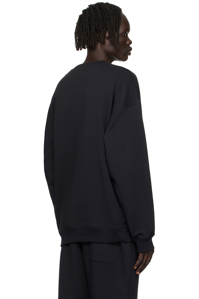 Cotton French terry sweatshirt.

· Rib-knit crewneck, hem, and cuffs
· Dropped shoulders
· Logo and text printed at sleeve

Supplier color: Black