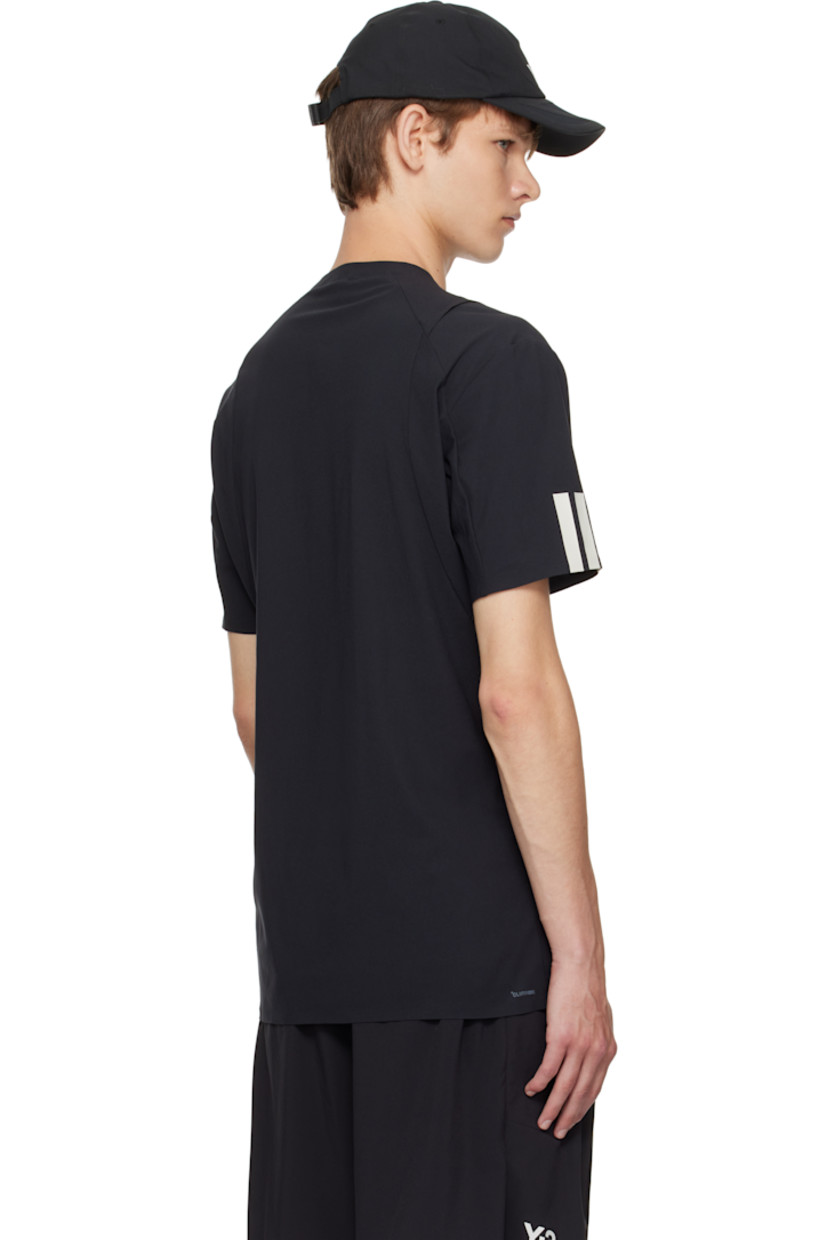Recycled nylon-blend jersey T-shirt. 

· Crewneck
· Half-zip closure 
· Bonded logo and exposed seam at chest 
· Stripes bonded at sleeve

Part of the US Open capsule.

Supplier color: Black