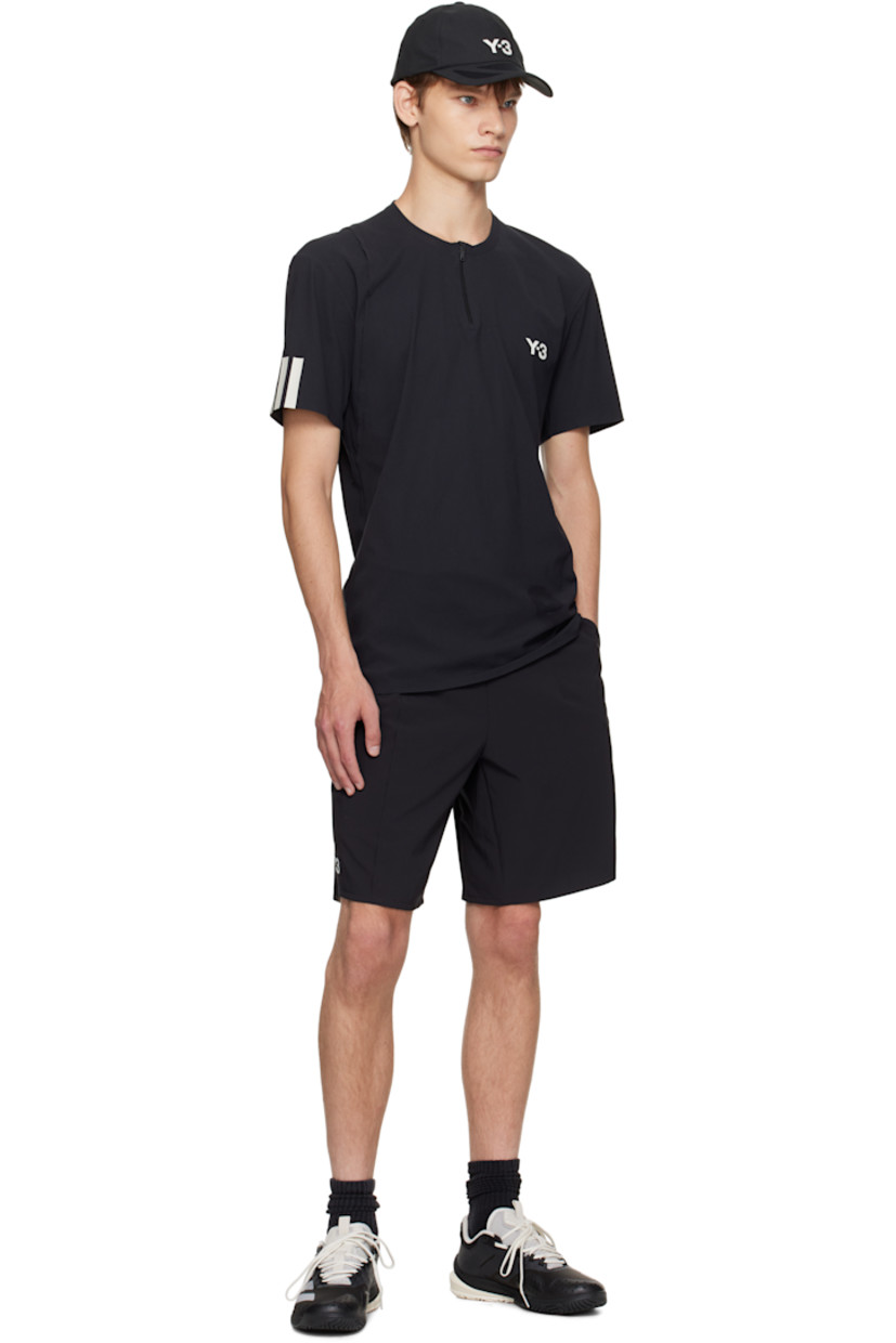 Recycled nylon-blend jersey T-shirt. 

· Crewneck
· Half-zip closure 
· Bonded logo and exposed seam at chest 
· Stripes bonded at sleeve

Part of the US Open capsule.

Supplier color: Black