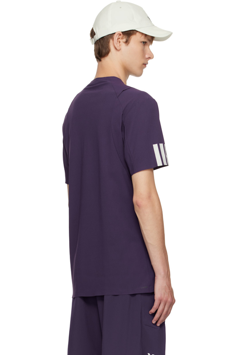 Recycled nylon-blend jersey T-shirt. 

· Crewneck
· Half-zip closure 
· Bonded logo and exposed seam at chest 
· Stripes bonded at sleeve

Part of the US Open capsule.

Supplier color: Aurora plum