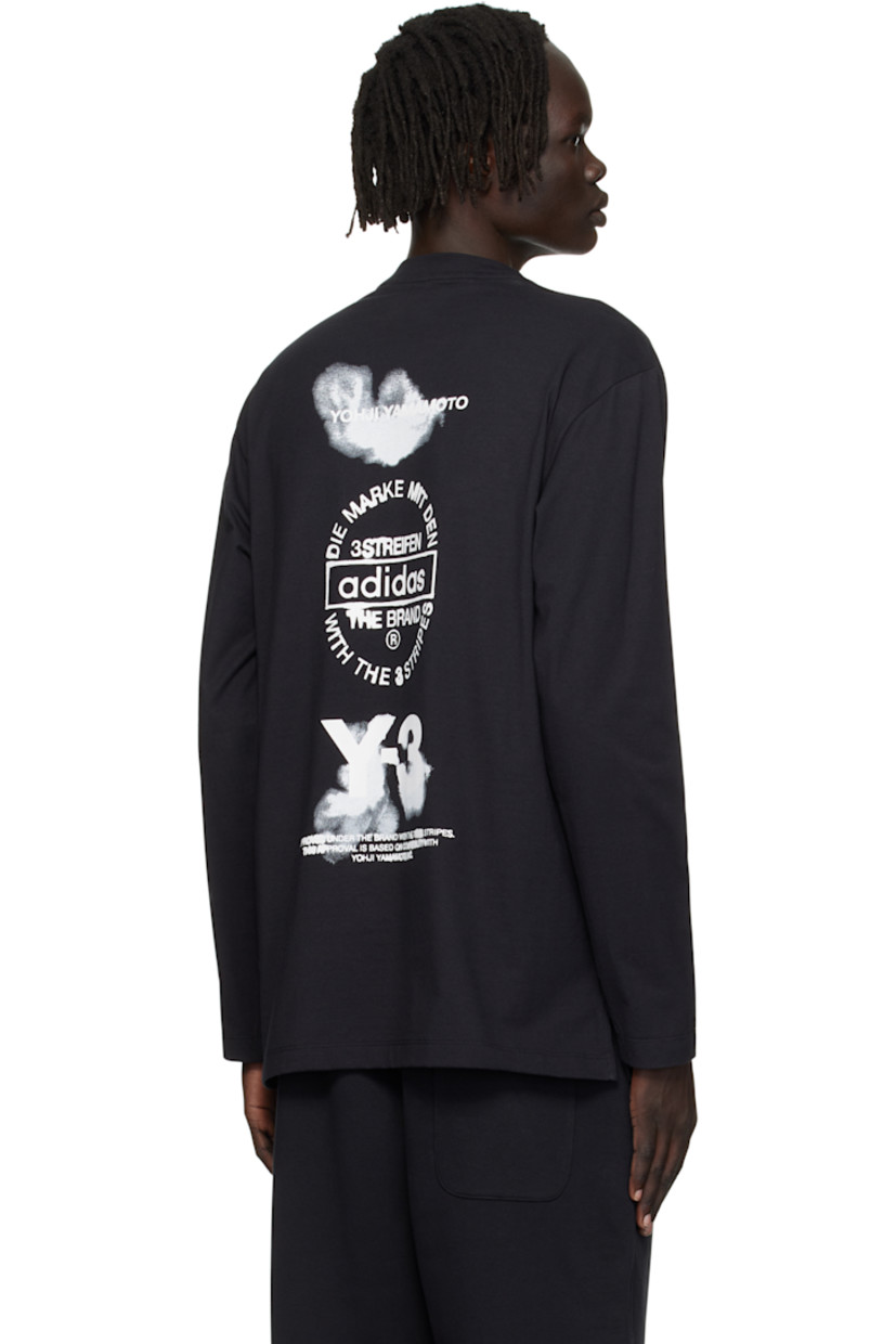 Cotton jersey T-shirt.

· Rib-knit crewneck
· Vented side seams
· Dropped shoulders
· Logo and text printed at back

Supplier color: Black