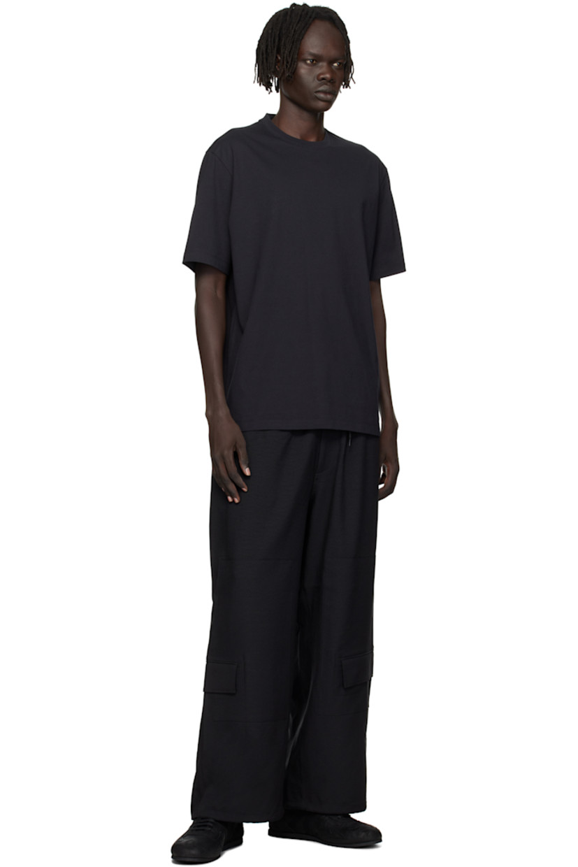 Cotton jersey T-shirt.

· Rib-knit crewneck
· Dropped shoulders
· Text and logo printed at back

Supplier color: Black
