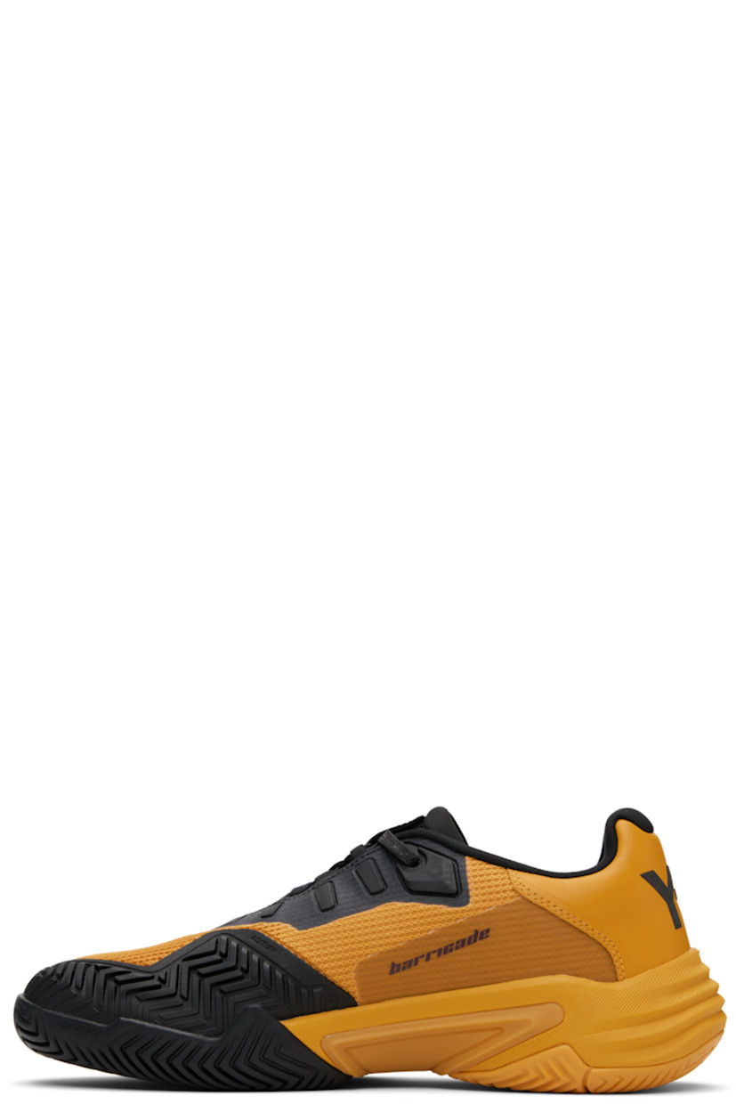 Low-top mesh sneakers.

· Offset lace-up closure
· Logo printed at tongue and heel tab
· Padded tongue and collar
· Bonded trim at sides
· Signature stripes at outer side
· Jersey lining
· Foam rubber midsole
· Treaded rubber sole

Part of the US Open capsule.

Supplier color: Collegiate gold/Collegiate gold