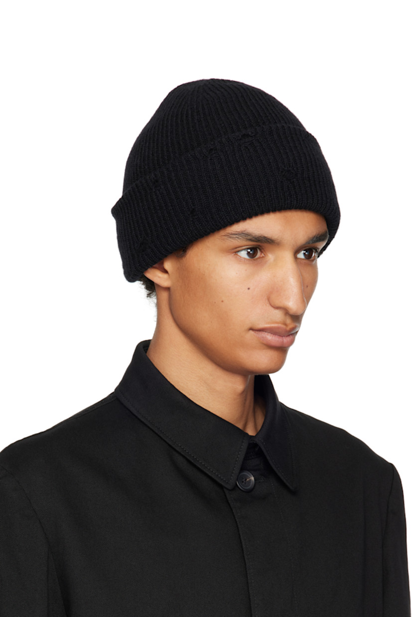 Rib-knit alpaca- and wool-blend beanie. 

· Distressing throughout
· Rolled brim

Supplier color: Black
