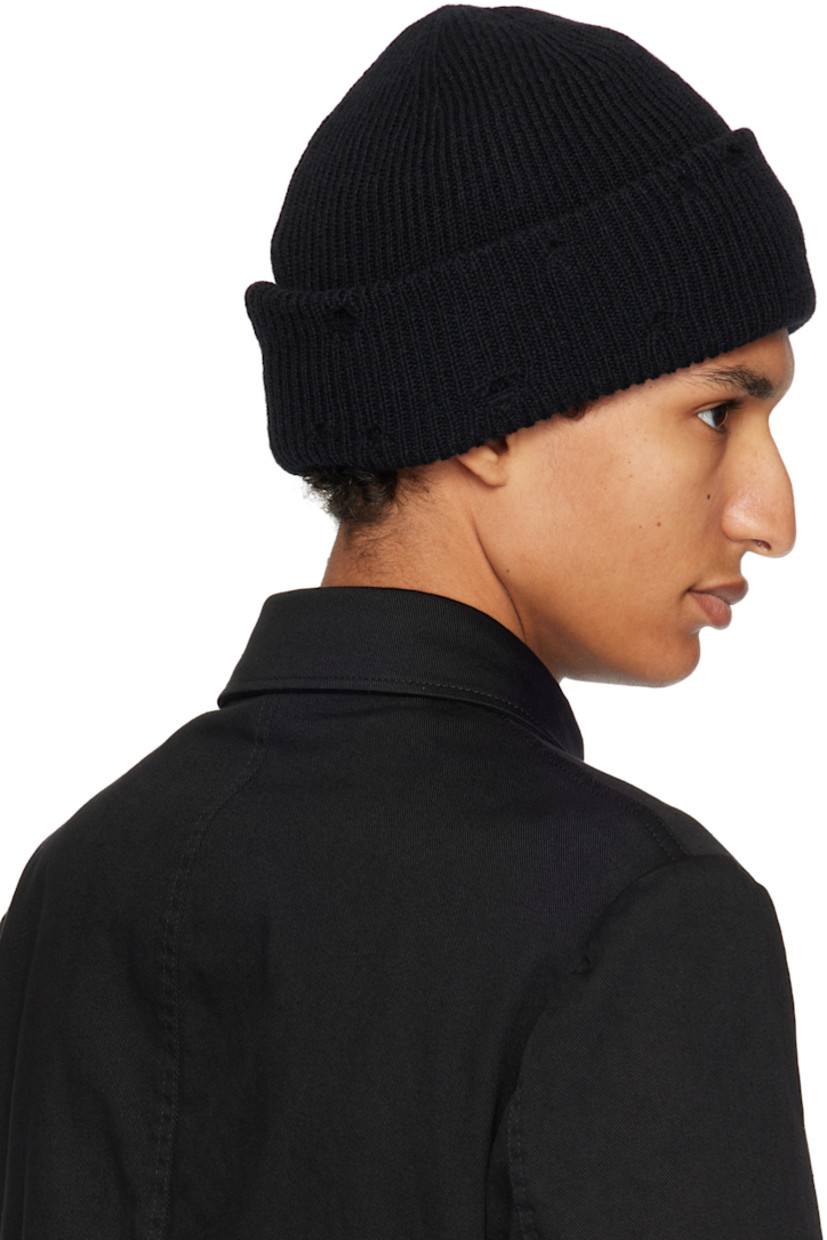 Rib-knit alpaca- and wool-blend beanie. 

· Distressing throughout
· Rolled brim

Supplier color: Black