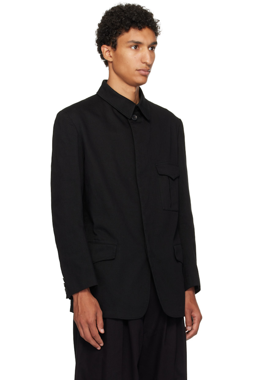 Cotton twill jacket. 

· Spread collar
· Concealed button closure
· Flap pockets at front
· Buttoned surgeon's cuffs
· Twin vents at back hem
· Welt pockets at interior
· Fully lined

Supplier color: Black
