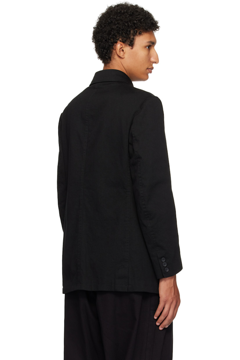 Cotton twill jacket. 

· Spread collar
· Concealed button closure
· Flap pockets at front
· Buttoned surgeon's cuffs
· Twin vents at back hem
· Welt pockets at interior
· Fully lined

Supplier color: Black
