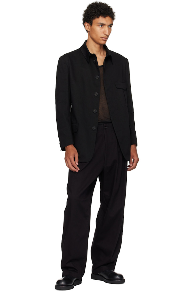 Cotton twill jacket. 

· Spread collar
· Concealed button closure
· Flap pockets at front
· Buttoned surgeon's cuffs
· Twin vents at back hem
· Welt pockets at interior
· Fully lined

Supplier color: Black