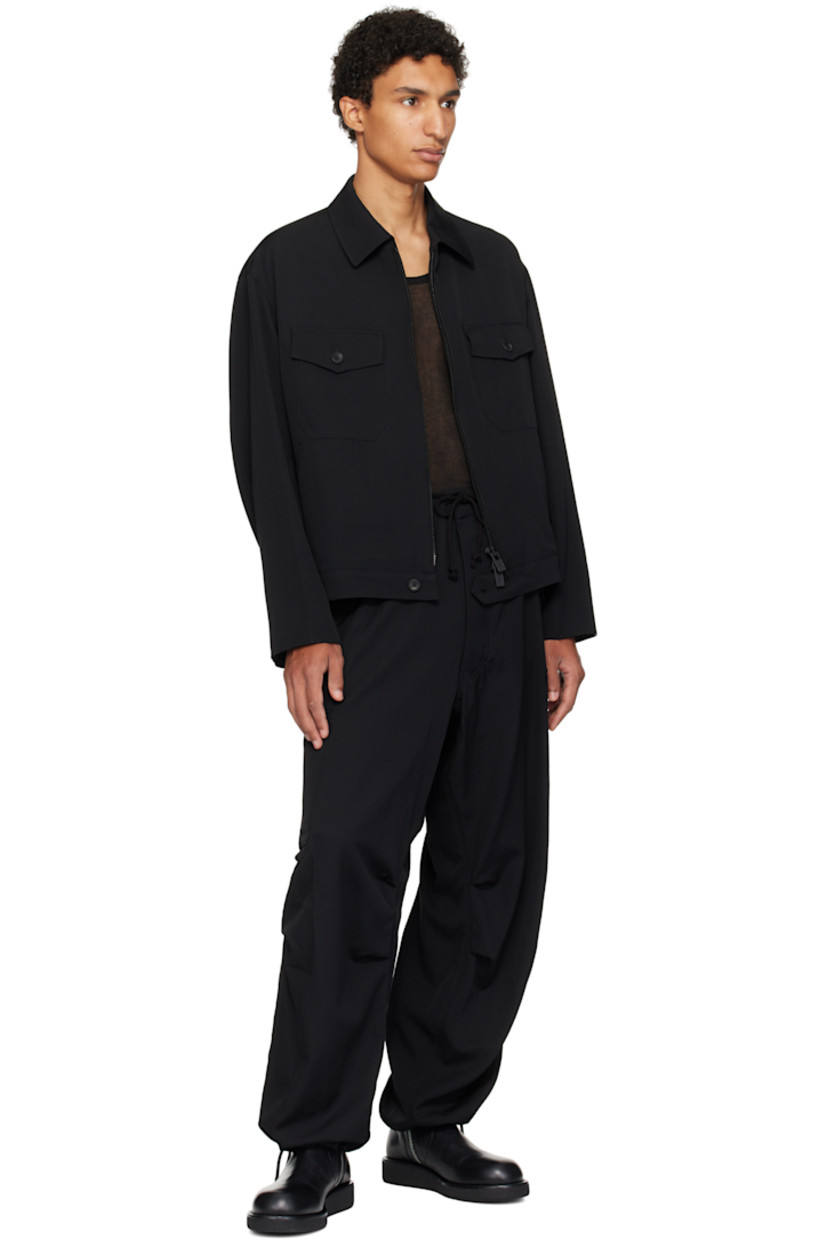 Wool gabardine cargo pants. 

· Drawstring at waistband 
· Belt loops
· Four-pocket styling
· Zip fly
· Tucks and pleat at knees
· Drawstring at cuffs
· Flap pocket at outseams

Supplier color: Black