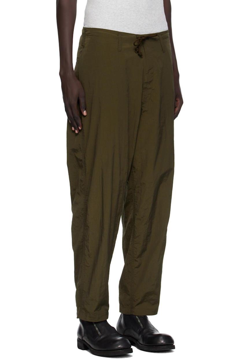 Nylon ripstop cargo pants.

· Drawstring and belt loops at waistband
· Four-pocket styling
· Zip fly
· Cargo pocket at outseam

Supplier color: Khaki