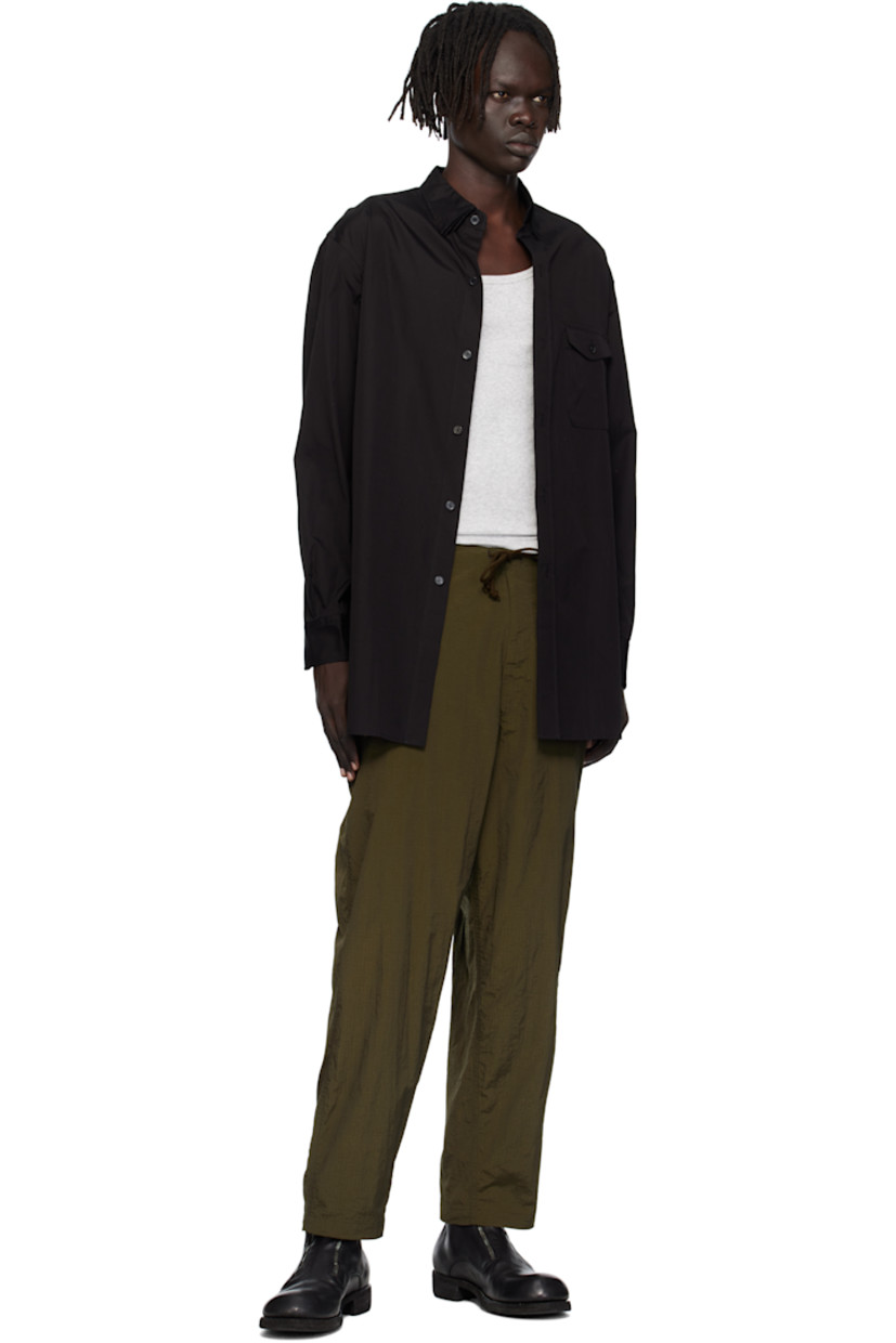 Nylon ripstop cargo pants.

· Drawstring and belt loops at waistband
· Four-pocket styling
· Zip fly
· Cargo pocket at outseam

Supplier color: Khaki
