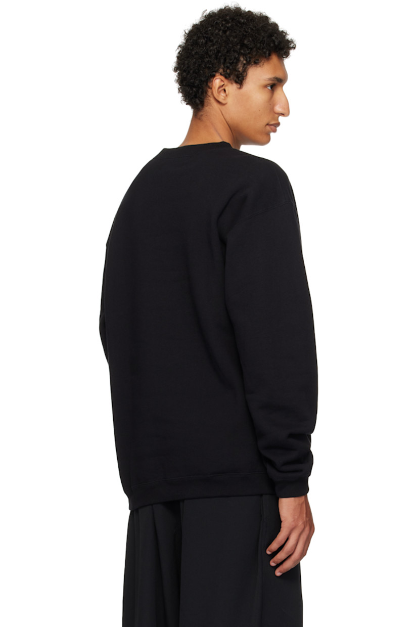 Cotton fleece sweatshirt. 

· Rib-knit crewneck, hem, and cuffs
· Graphic printed at front
· Dropped shoulders

Supplier color: Black