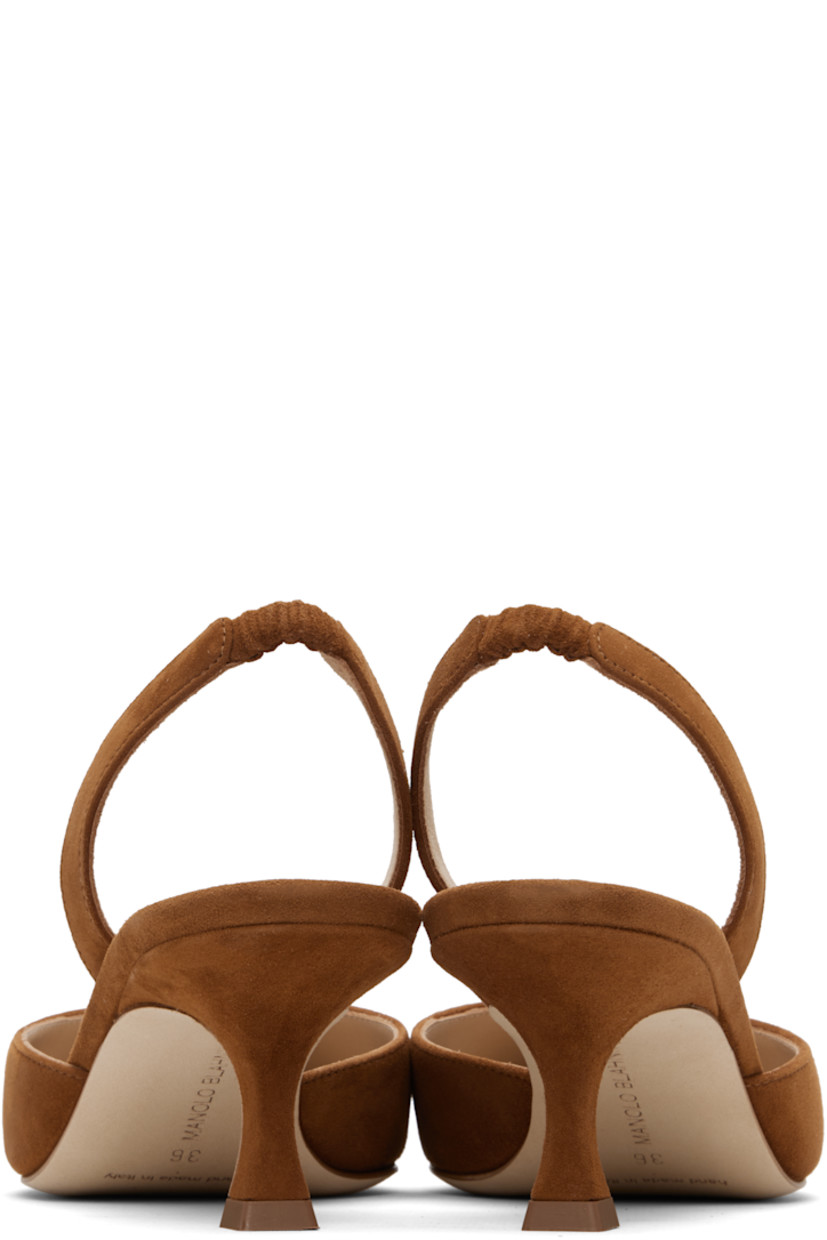 Handcrafted goatskin suede heeled sandals. 

· Pointed toe
· Partially elasticized slingback strap
· Inset logo patch at footbed
· Covered kitten heel with rubber injection
· Nubuck sole
· Heel: H2"

Supplier color: Medium brown