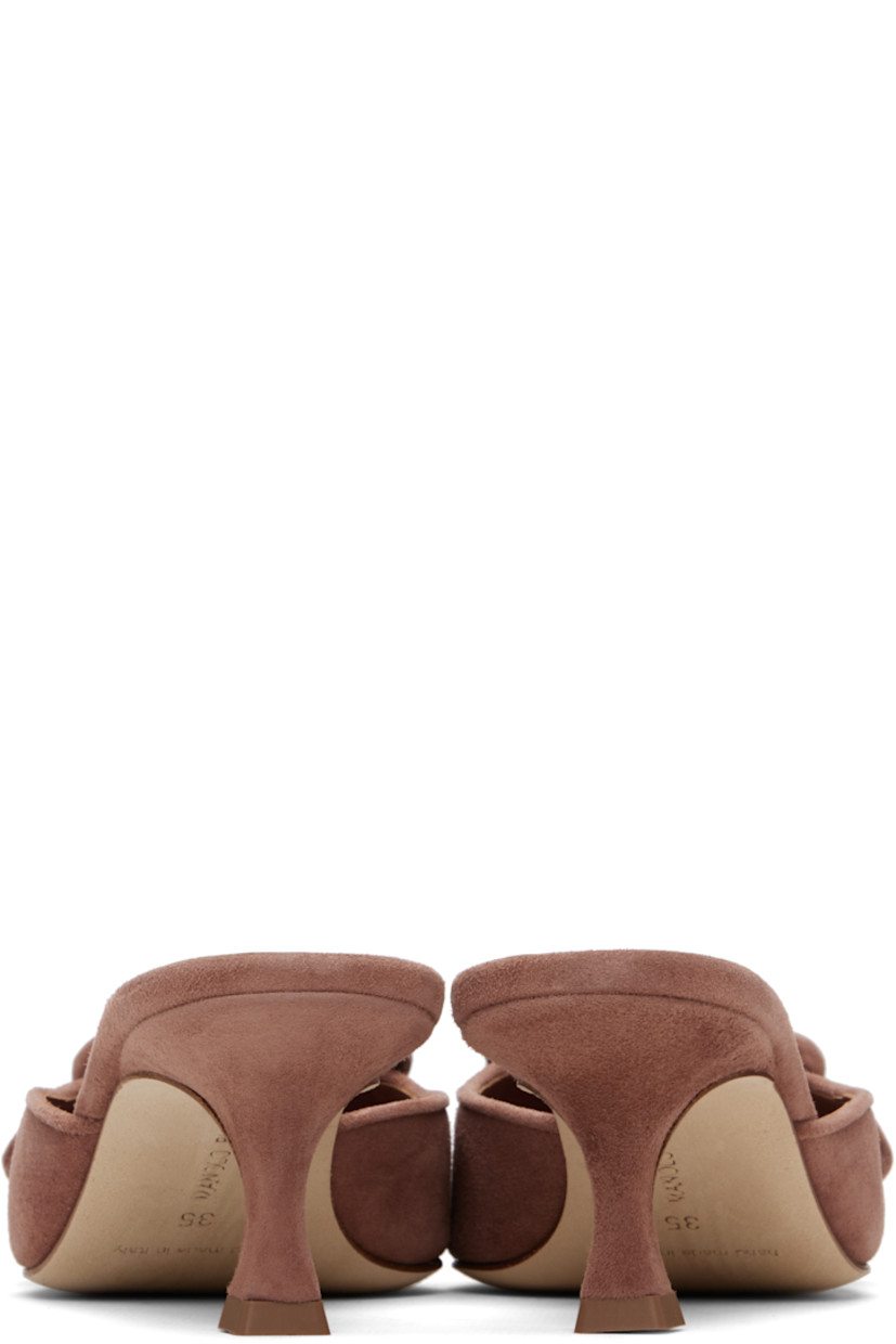 Handcrafted goatskin suede slip-on heeled sandals. 

· Pointed toe
· Covered buckle hardware at vamp
· Inset logo patch at padded footbed
· Buffed kidskin lining
· Covered kitten heel with rubber injection
· Calfskin nubuck sole
· Heel: H2"

Supplier color: Brown