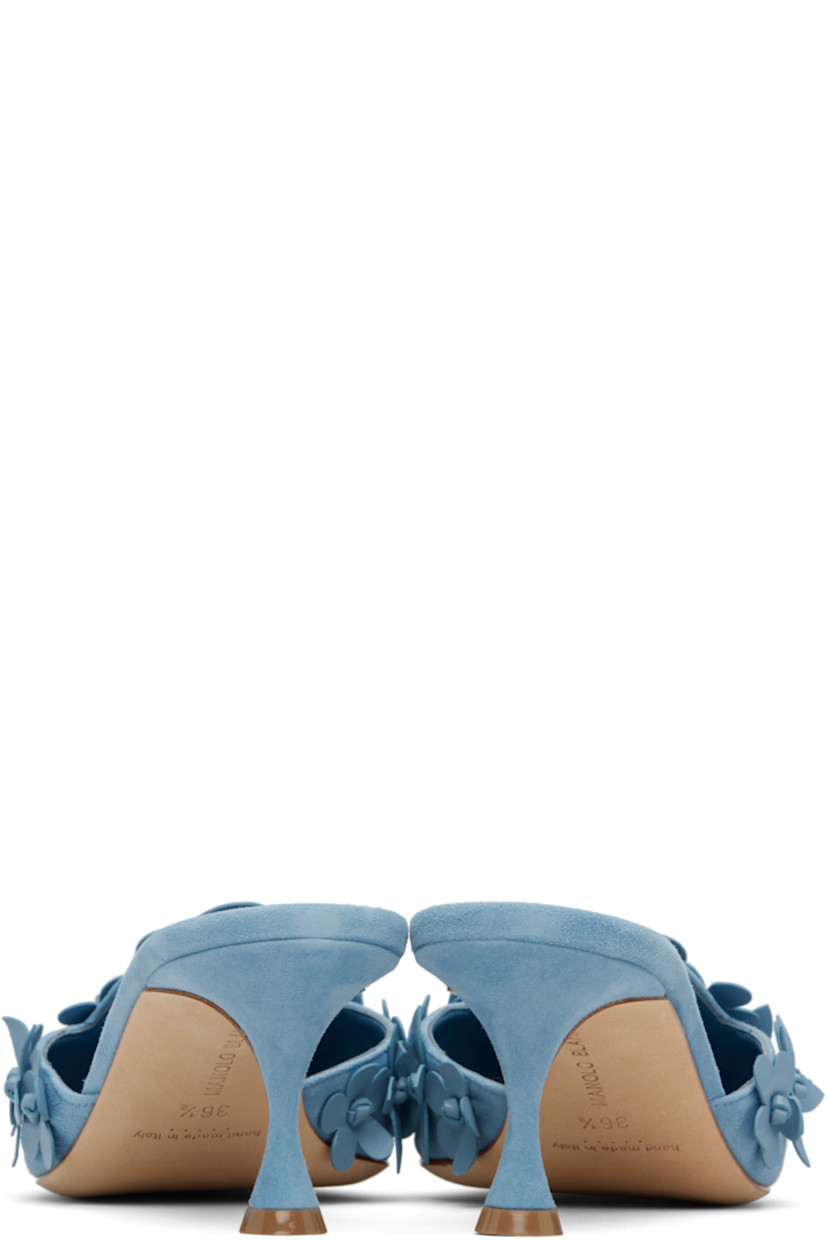 Handcrafted goatskin suede mules. 

· Pointed toe
· Lambskin floral appliqués at vamp
· Inset logo patch at perforated leather footbed
· Covered kitten heel with rubber injection
· Calfskin nubuck sole
· Heel: H2.25"

Supplier color: Light blue