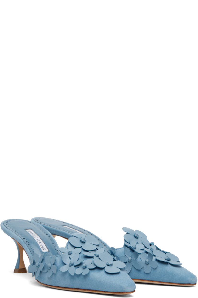 Handcrafted goatskin suede mules. 

· Pointed toe
· Lambskin floral appliqués at vamp
· Inset logo patch at perforated leather footbed
· Covered kitten heel with rubber injection
· Calfskin nubuck sole
· Heel: H2.25"

Supplier color: Light blue