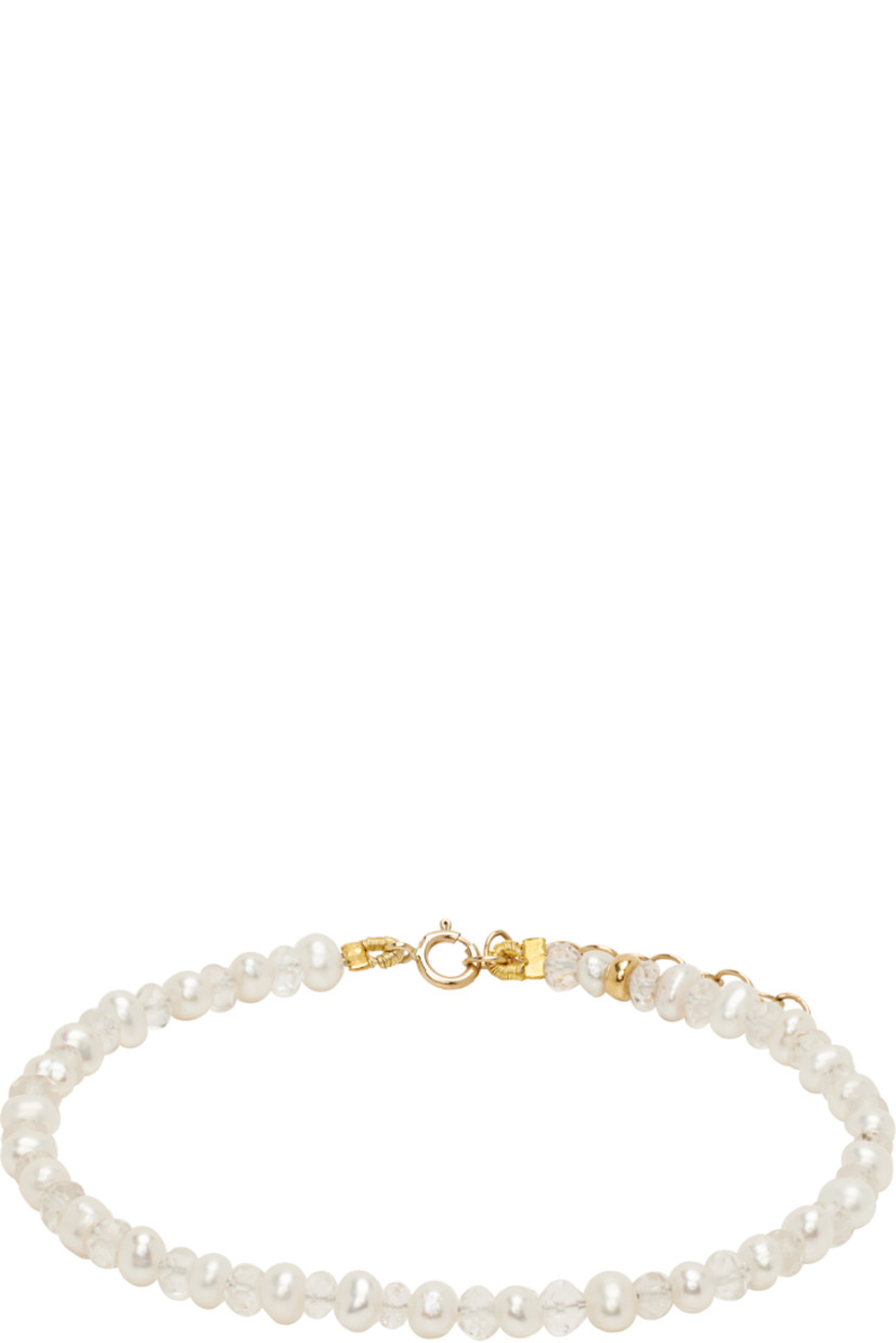Handcrafted beaded Herkimer diamond quartz and pearl bracelet in white.

· Adjustable spring-ring fastening
· 14k gold hardware
· L7"

Supplier color: Herkimer diamond