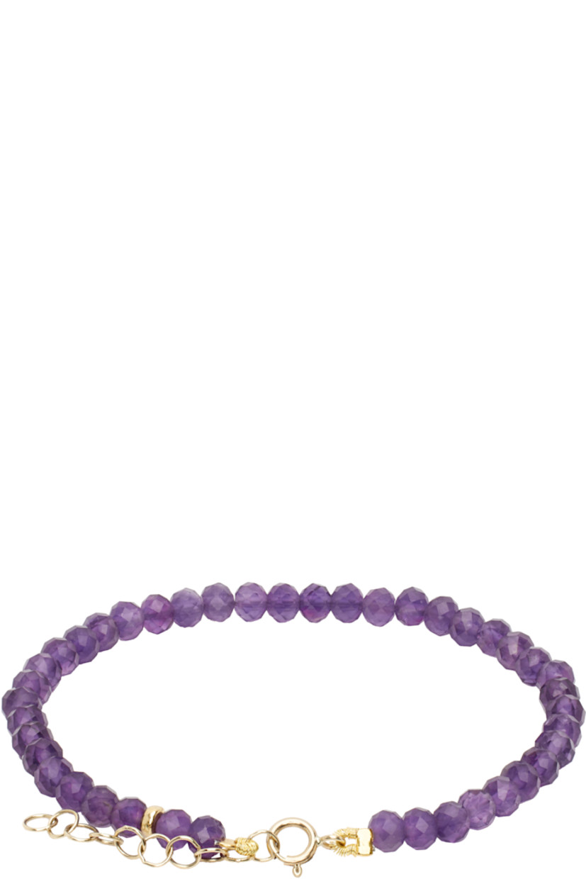 Handcrafted beaded amethyst bracelet in purple.

· Adjustable spring-ring fastening
· 14k gold hardware
· L7"

Supplier color: Amethyst