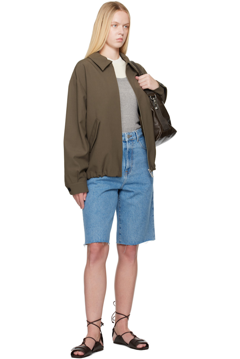 Loose-fit non-stretch denim shorts. Fading and subtle distressing throughout. 

· Belt loops
· Five-pocket styling
· Zip fly
· Raw edge at cuffs
· Logo-engraved silver-tone hardware
· Contrast stitching in tan

Supplier color: Denim blue