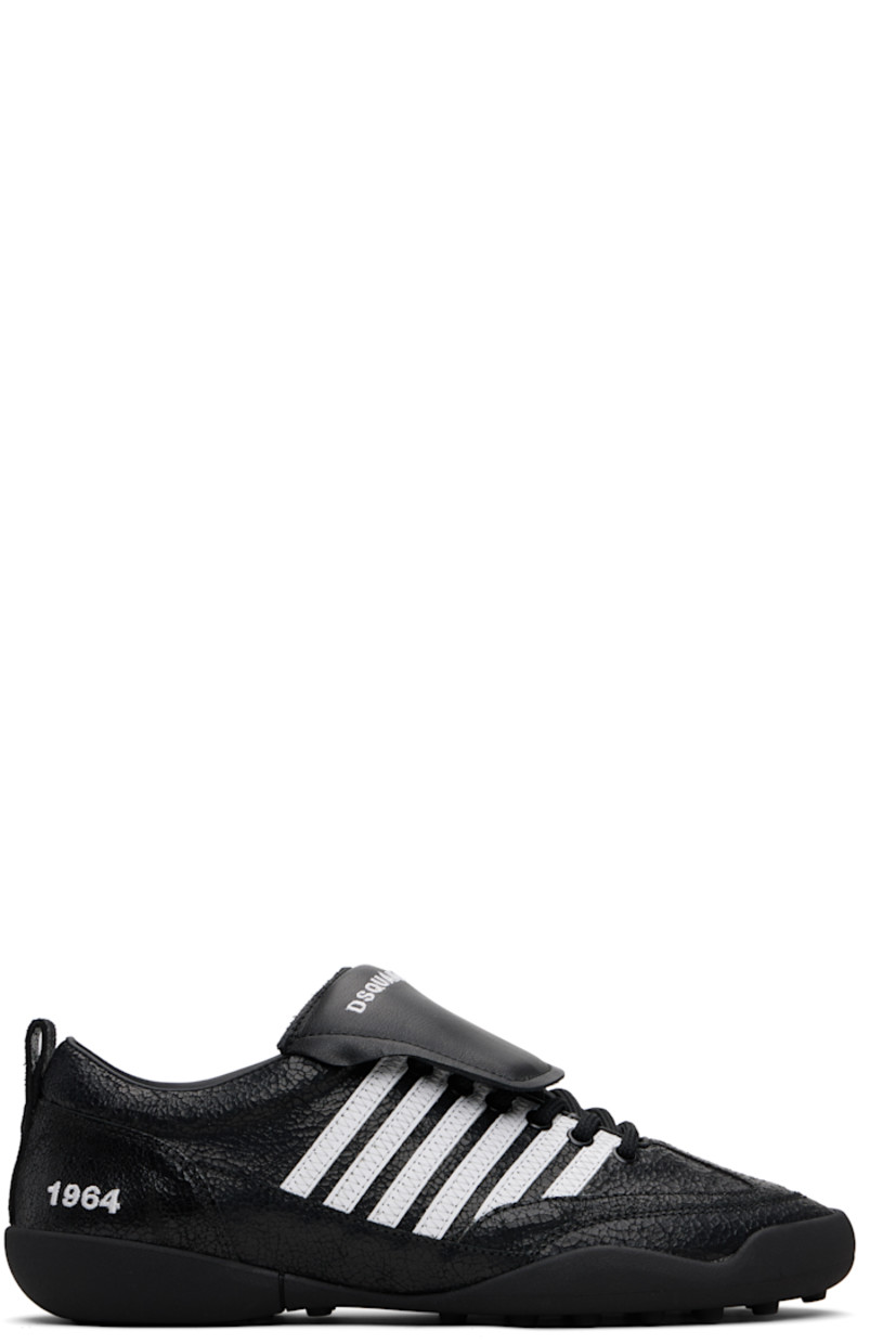 Low-top crackled leather sneakers.

· Smudging and subtle distressing throughout
· Lace-up closure
· Logo embroidered at padded foldover tongue
· Padded collar
· Stripe appliqués at sides
· Text embroidered at outer side
· Pull-loop at heel tab
· Buffed leather and suede lining
· Treaded rubber sole

Supplier color: Black/White