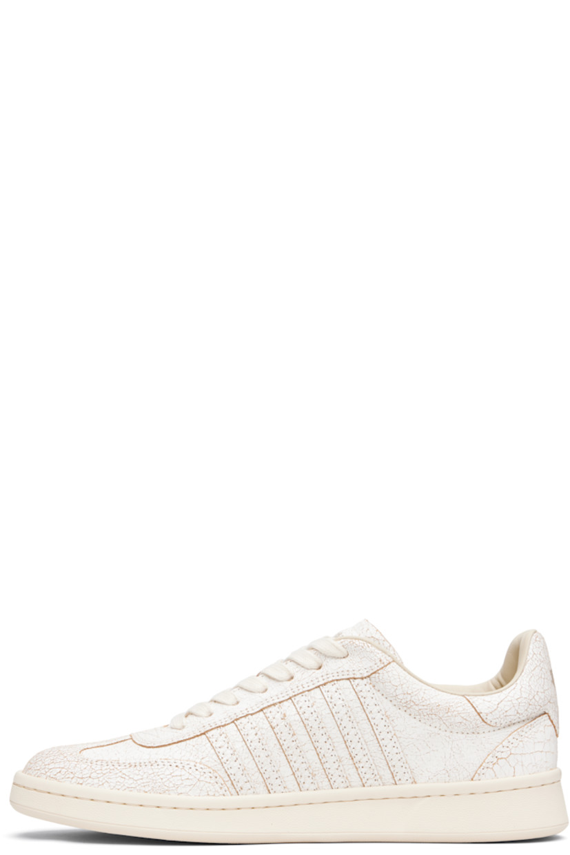 Low-top cracked leather sneakers.

· Lace-up closure
· Logo printed at padded tongue 
· Padded collar
· Text embroidered at outer side
· Graphic printed at heel tab
· Terrycloth lining
· Treaded rubber sole

Supplier color: Vintage white