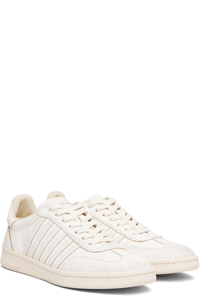 Low-top cracked leather sneakers.

· Lace-up closure
· Logo printed at padded tongue 
· Padded collar
· Text embroidered at outer side
· Graphic printed at heel tab
· Terrycloth lining
· Treaded rubber sole

Supplier color: Vintage white