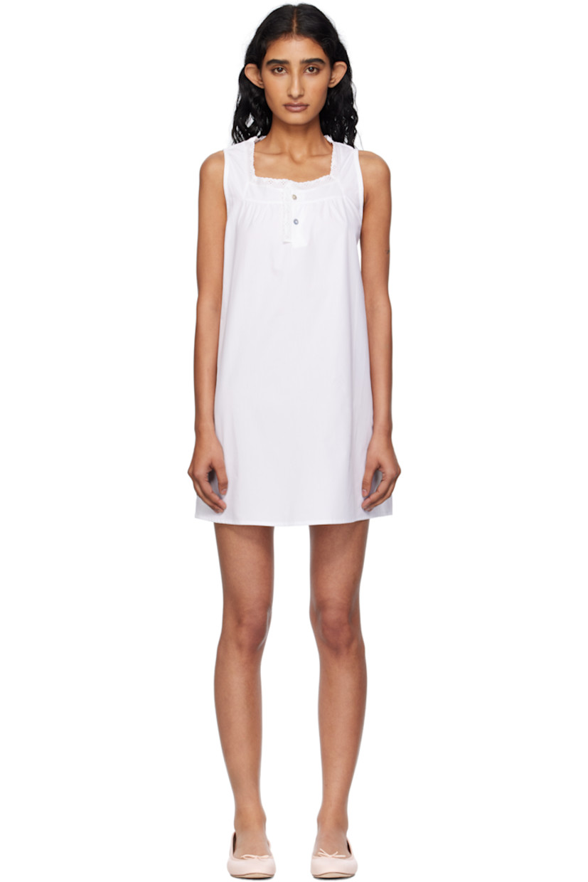 Plain-woven cotton minidress.

· Scalloped pointelle trim at square collar
· Two-button placket
· Mother-of-pearl hardware

Supplier color: White