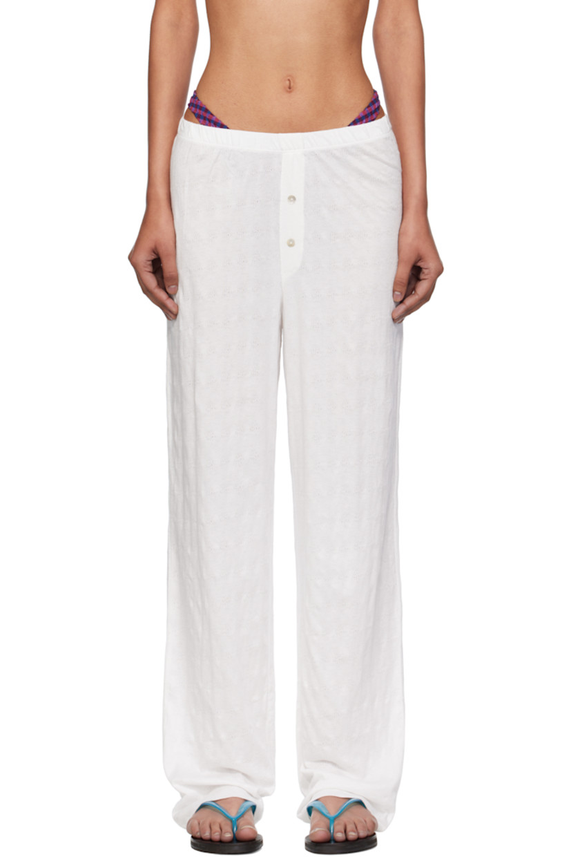 Stretch cotton pointelle lounge pants.

· Elasticized waistband
· Button hardware at mock fly 

Supplier color: White