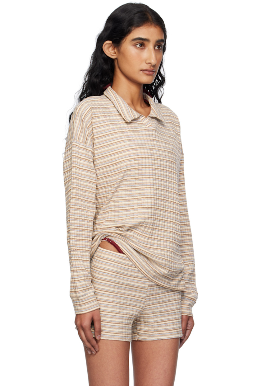 Rib-knit stretch cotton-blend polo.

· Striped throughout
· Spread collar
· Open placket
· Logo flag at side seam
· Dropped shoulders

Supplier color: Multi