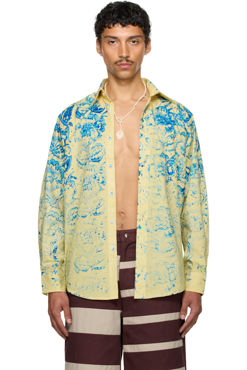 Cotton-blend twill shirt. Floral pattern printed throughout.

· Spread collar
· Button closure
· Patch pocket
· Shirttail hem
· Adjustable buttoned barrel cuffs
· Box pleat at back yoke

Part of the exclusive SSENSE HEAT capsule.

Supplier color: Yellow/Blue