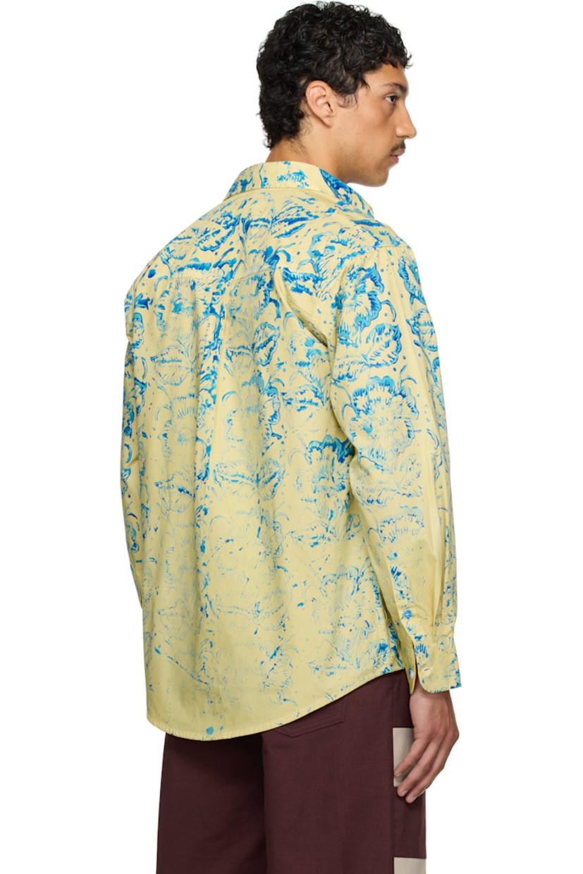Cotton-blend twill shirt. Floral pattern printed throughout.

· Spread collar
· Button closure
· Patch pocket
· Shirttail hem
· Adjustable buttoned barrel cuffs
· Box pleat at back yoke

Part of the exclusive SSENSE HEAT capsule.

Supplier color: Yellow/Blue