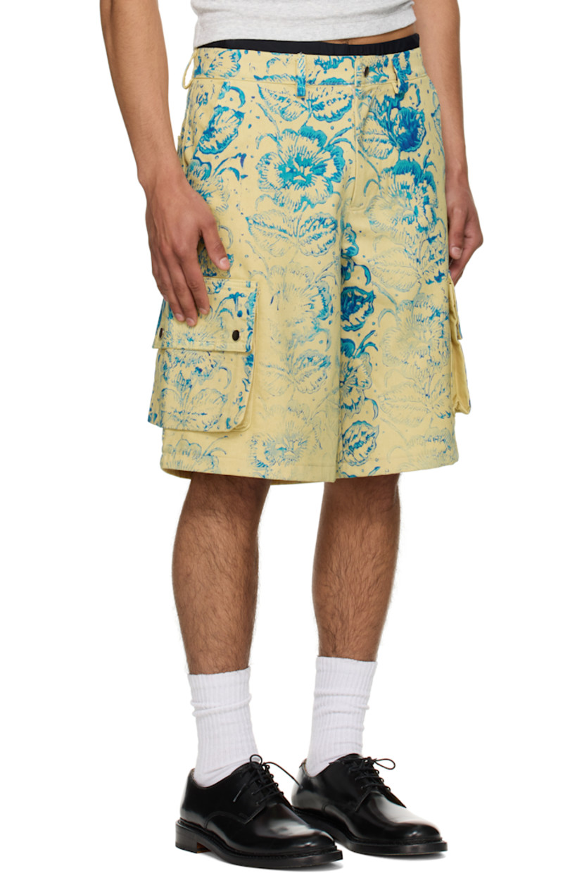 Cotton twill cargo shorts. Floral pattern printed throughout.

· Belt loops
· Four-pocket styling
· Zip fly
· Cargo pocket at outseams

Part of the exclusive SSENSE HEAT capsule.

Supplier color: Yellow/Blue