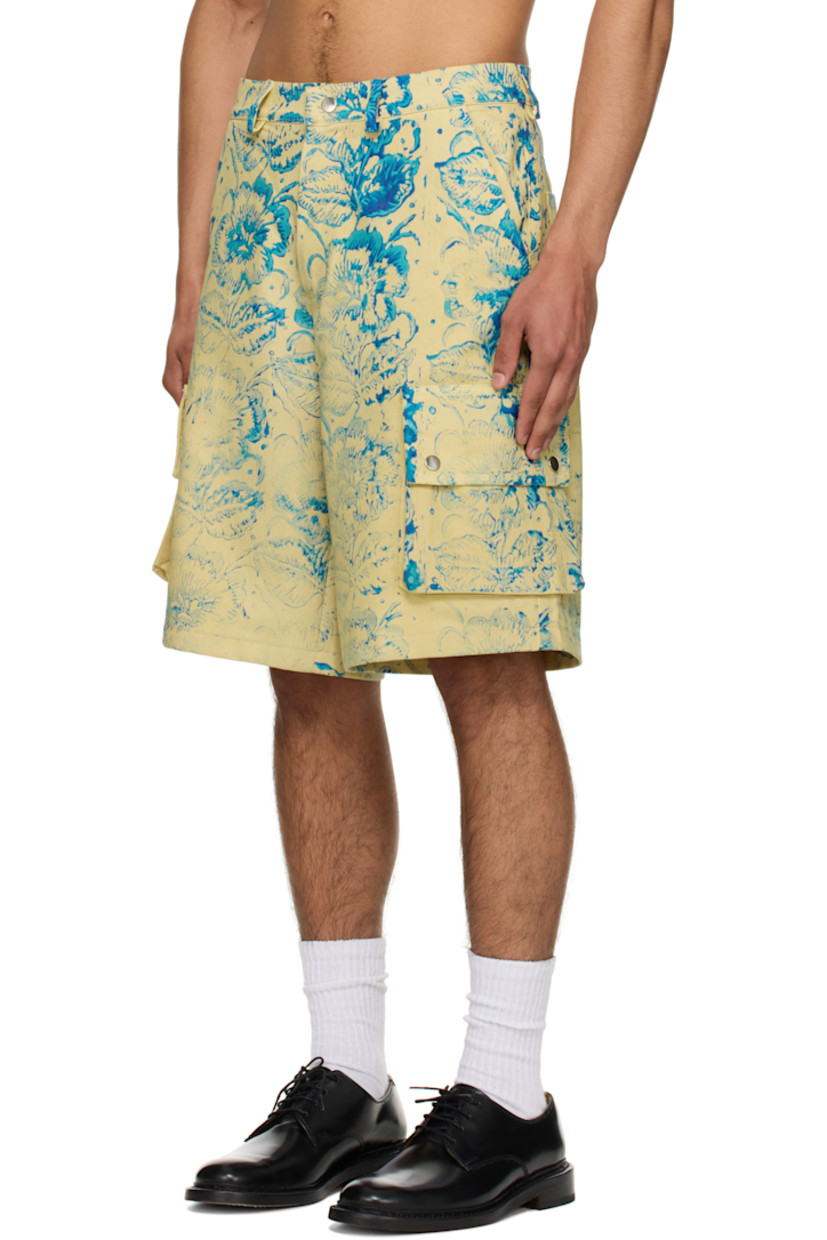 Cotton twill cargo shorts. Floral pattern printed throughout.

· Belt loops
· Four-pocket styling
· Zip fly
· Cargo pocket at outseams

Part of the exclusive SSENSE HEAT capsule.

Supplier color: Yellow/Blue