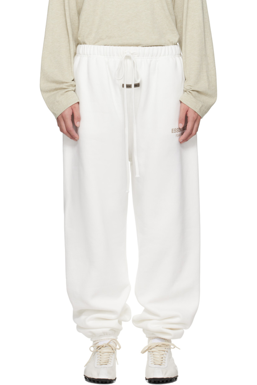 Cotton-blend fleece sweatpants.

· Drawstring at elasticized waistband
· Two-pocket styling
· Logo patch at front
· Reflective logo bonded at leg
· Elasticized cuffs

Supplier color: Cloud white