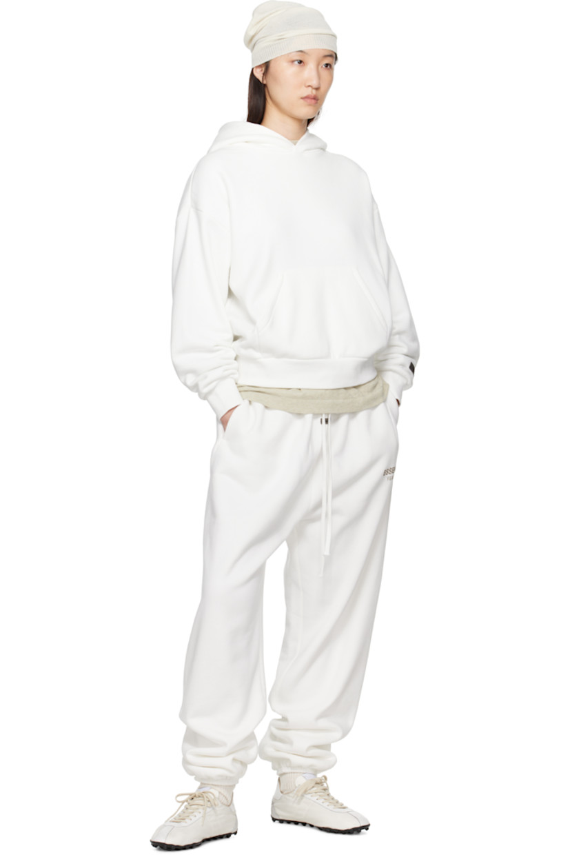 Cotton-blend fleece sweatpants.

· Drawstring at elasticized waistband
· Two-pocket styling
· Logo patch at front
· Reflective logo bonded at leg
· Elasticized cuffs

Supplier color: Cloud white