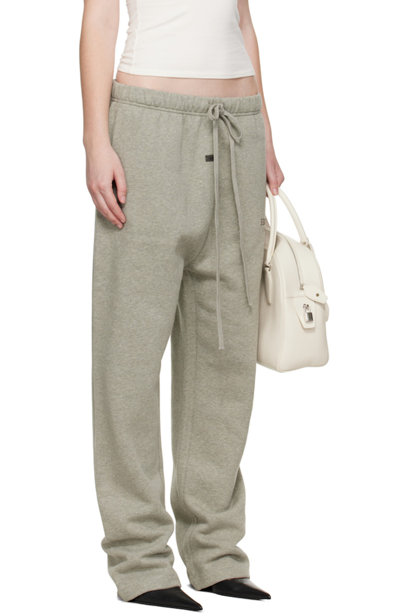 Cotton-blend fleece lounge pants.

· Drawstring at elasticized waistband
· Two-pocket styling
· Rubber logo patch at front
· Bonded logo at leg 

Supplier color: Concrete heather