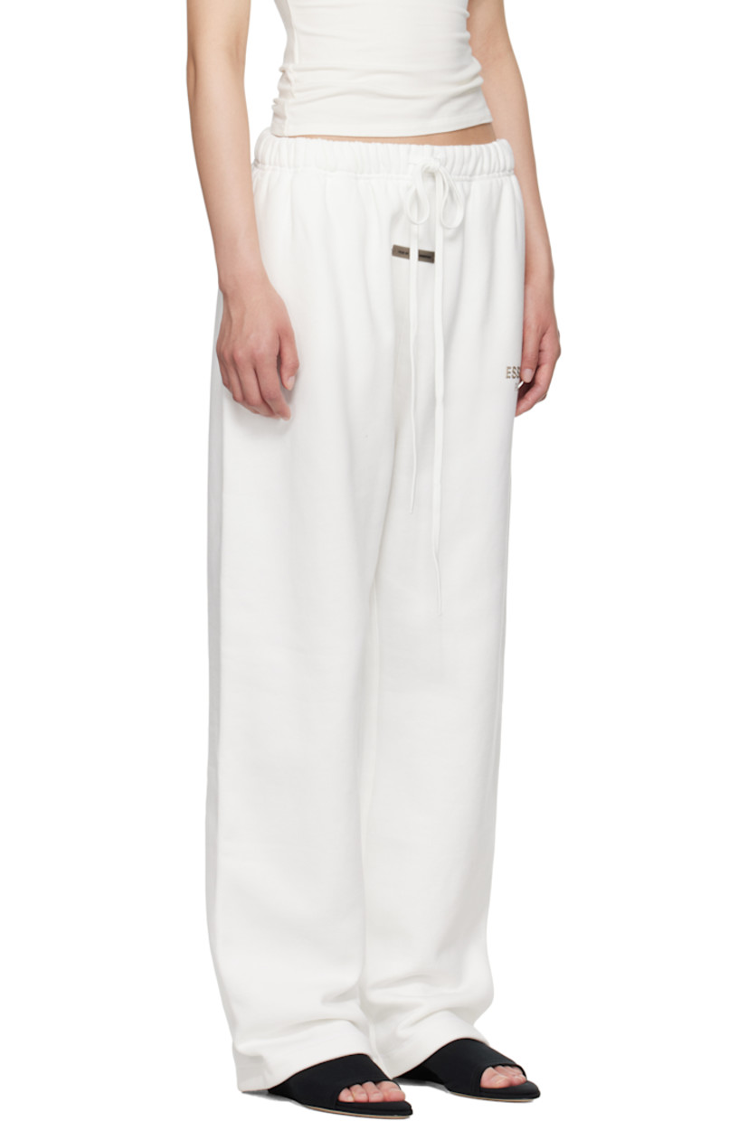 Loose-fit cotton-blend fleece sweatpants.

· Drawstring at elasticized waistband
· Two-pocket styling
· Logo patch at front
· Reflective logo bonded at leg
· Dropped inseam

Supplier color: Cloud white
