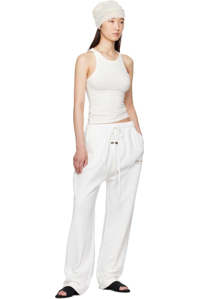 Loose-fit cotton-blend fleece sweatpants.

· Drawstring at elasticized waistband
· Two-pocket styling
· Logo patch at front
· Reflective logo bonded at leg
· Dropped inseam

Supplier color: Cloud white