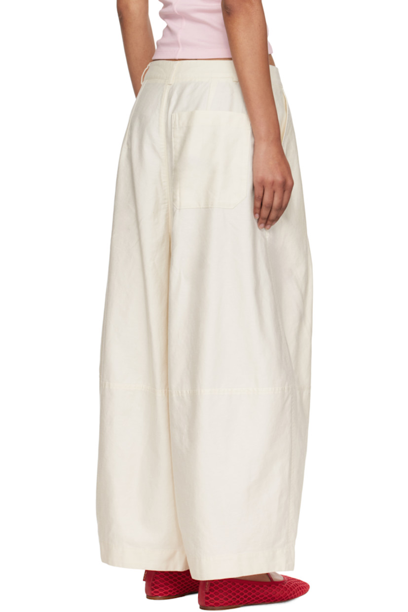Garment-dyed cotton- and linen-blend twill trousers.

· Paneled construction
· Wide-leg
· High-rise
· Belt loops
· Three-pocket styling
· Zip fly
· Pleats at front
· Corozo hardware

Supplier color: Off white