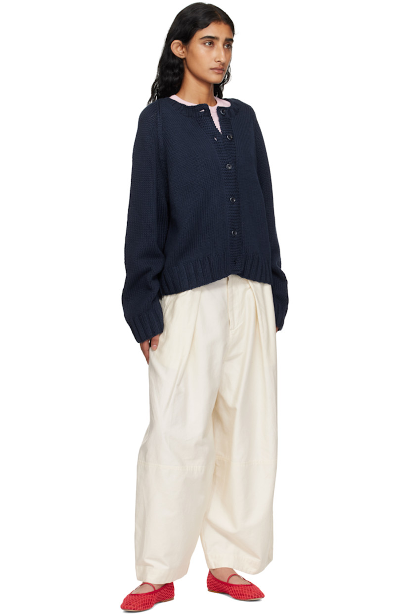 Garment-dyed cotton- and linen-blend twill trousers.

· Paneled construction
· Wide-leg
· High-rise
· Belt loops
· Three-pocket styling
· Zip fly
· Pleats at front
· Corozo hardware

Supplier color: Off white