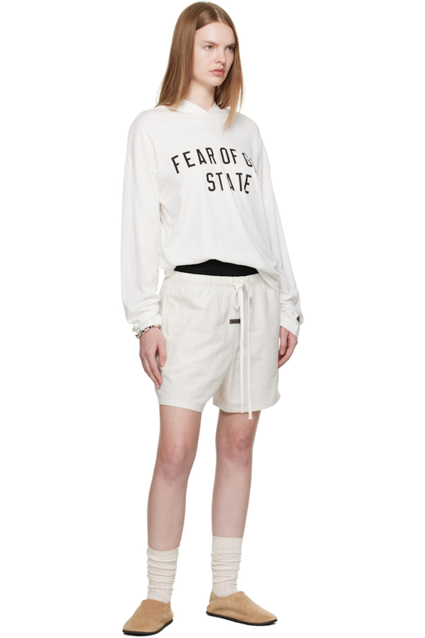 Cotton broadcloth shorts.

· Drawstring at elasticized waistband 
· Two-pocket styling
· Rubber logo patch at front

Supplier color: Cloud white