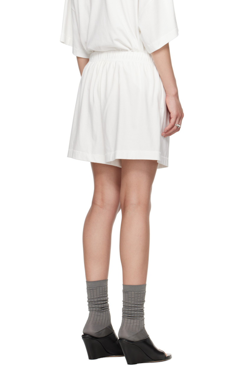 Cotton jersey shorts.

· Drawstring at elasticized waistband
· Two-pocket styling
· Logo patch at front

Supplier color: Cloud white