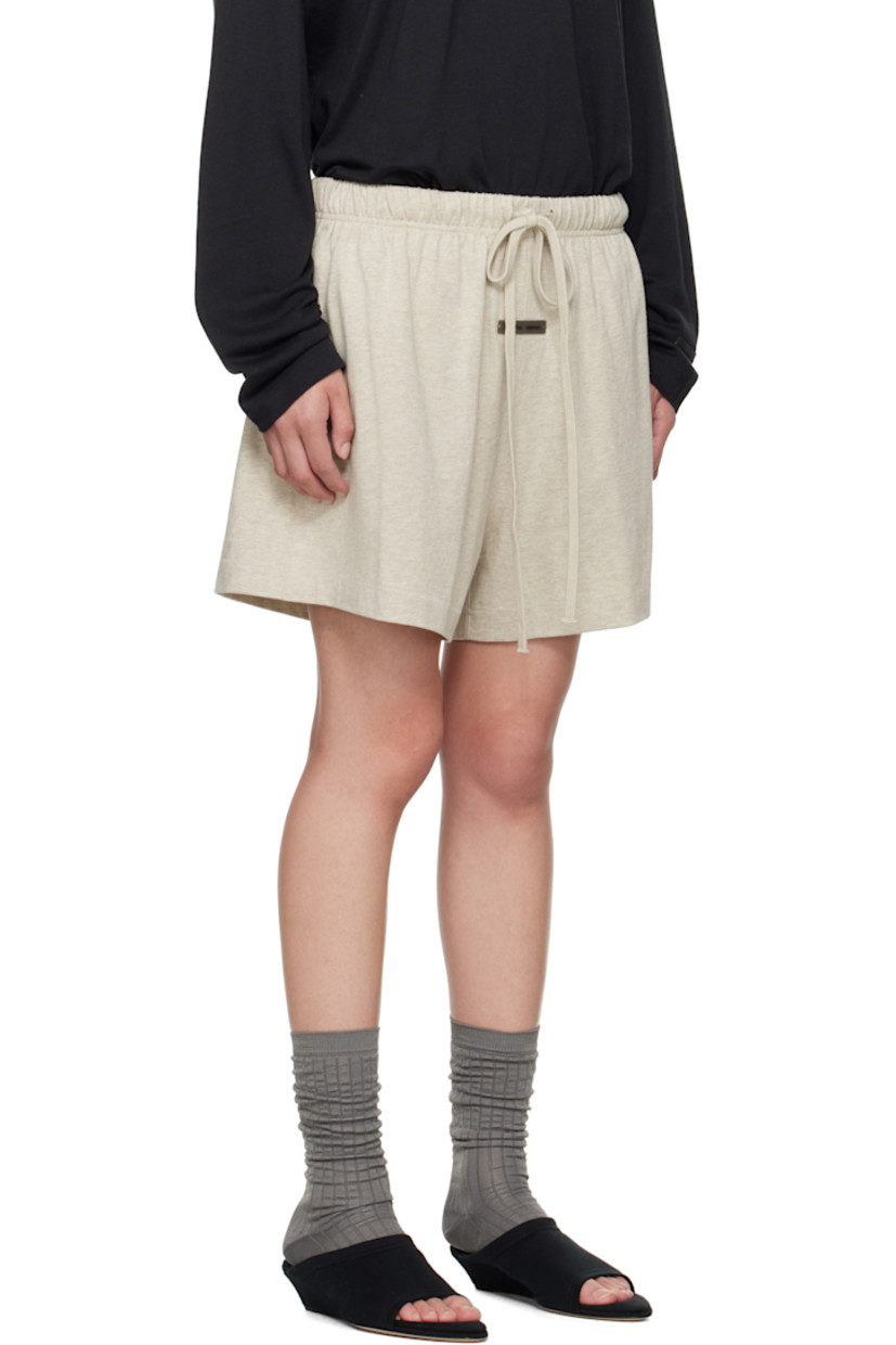 Cotton jersey shorts.

· Drawstring at elasticized waistband
· Two-pocket styling
· Logo patch at front

Supplier color: Heather stone