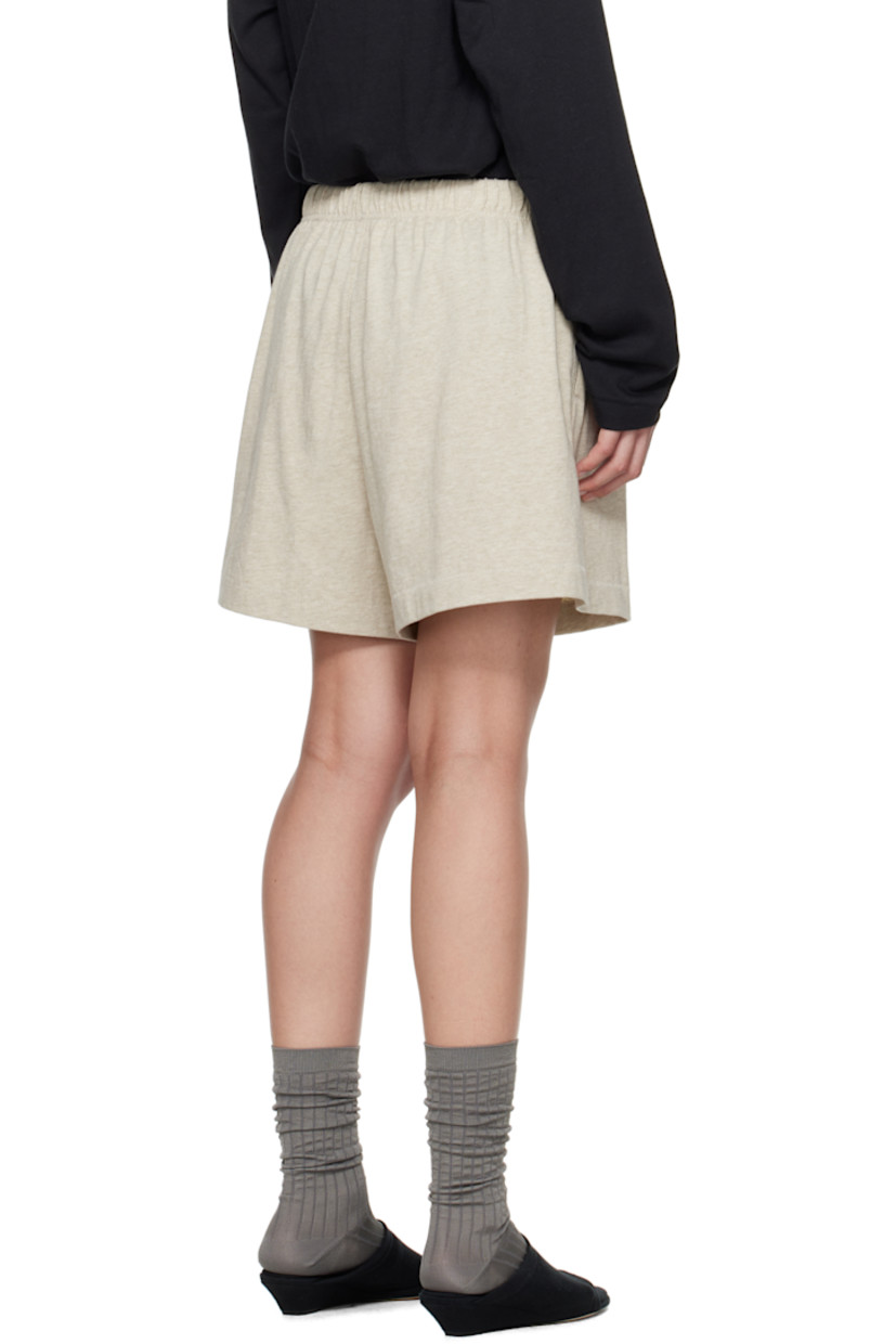 Cotton jersey shorts.

· Drawstring at elasticized waistband
· Two-pocket styling
· Logo patch at front

Supplier color: Heather stone