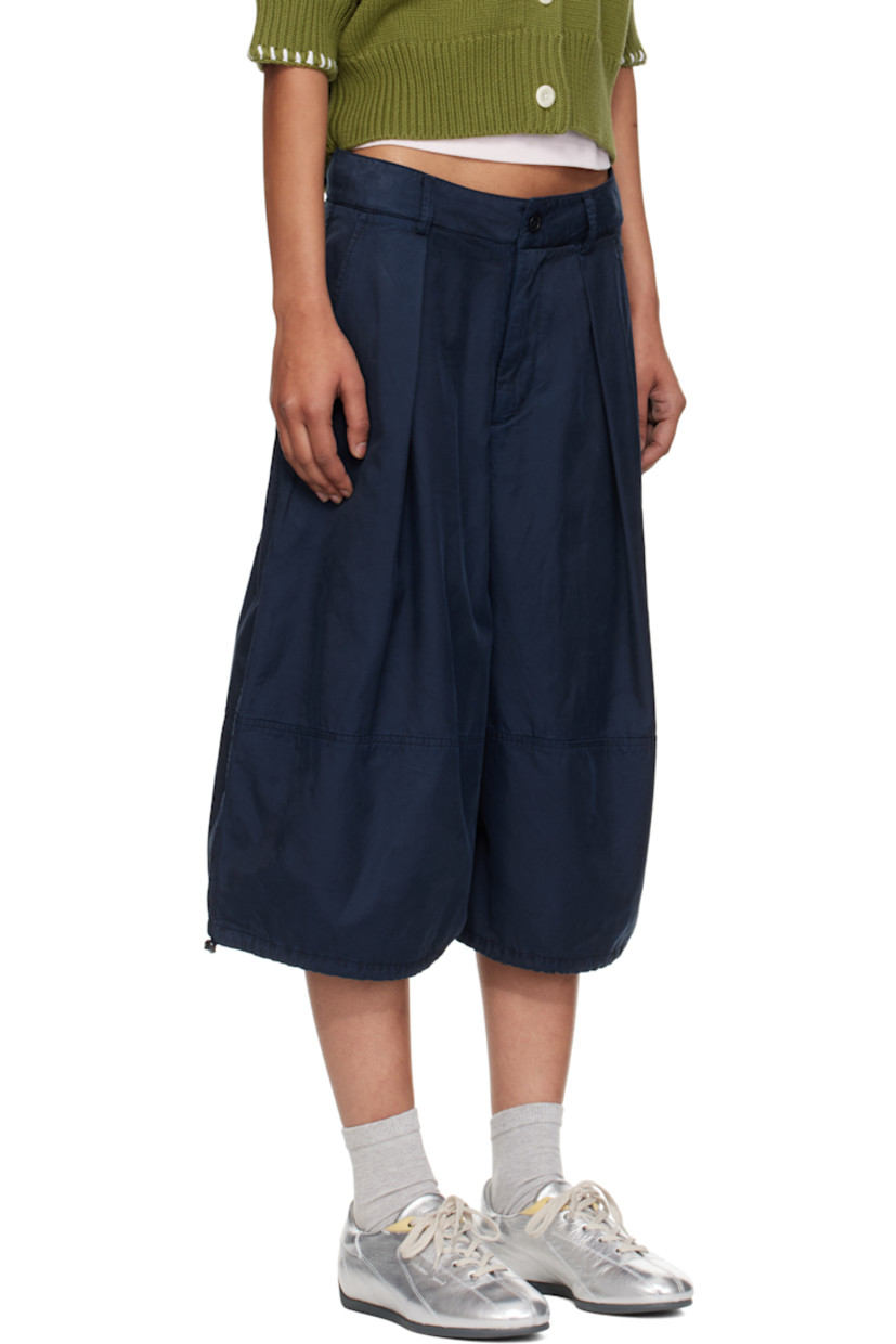 Garment-dyed cotton- and cupro-blend sateen shorts.

· Wide-leg
· Paneled construction
· Belt loops
· Three-pocket styling
· Zip fly
· Bungee-style drawstring at cuffs
· Corozo hardware

Supplier color: Navy