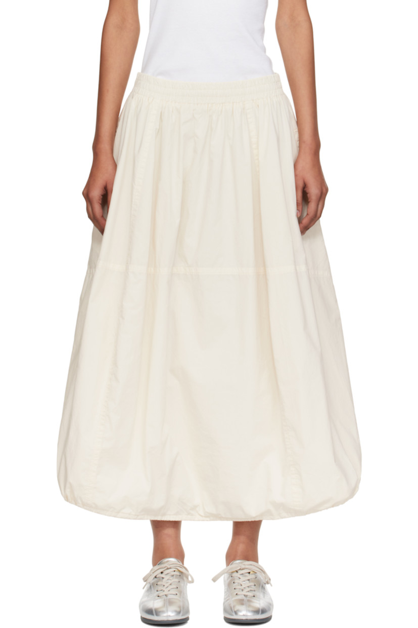 Lightweight cotton poplin midi skirt.

· Garment-dyed and enzyme-washed
· Paneled construction
· Concealed drawstring at elasticized waistband
· Two-pocket styling
· Bungee-style drawstring at balloon hem
· Fully lined

Supplier color: Off white