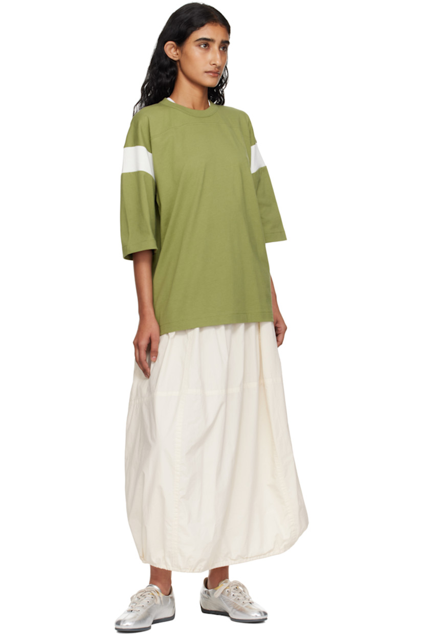 Lightweight cotton poplin midi skirt.

· Garment-dyed and enzyme-washed
· Paneled construction
· Concealed drawstring at elasticized waistband
· Two-pocket styling
· Bungee-style drawstring at balloon hem
· Fully lined

Supplier color: Off white