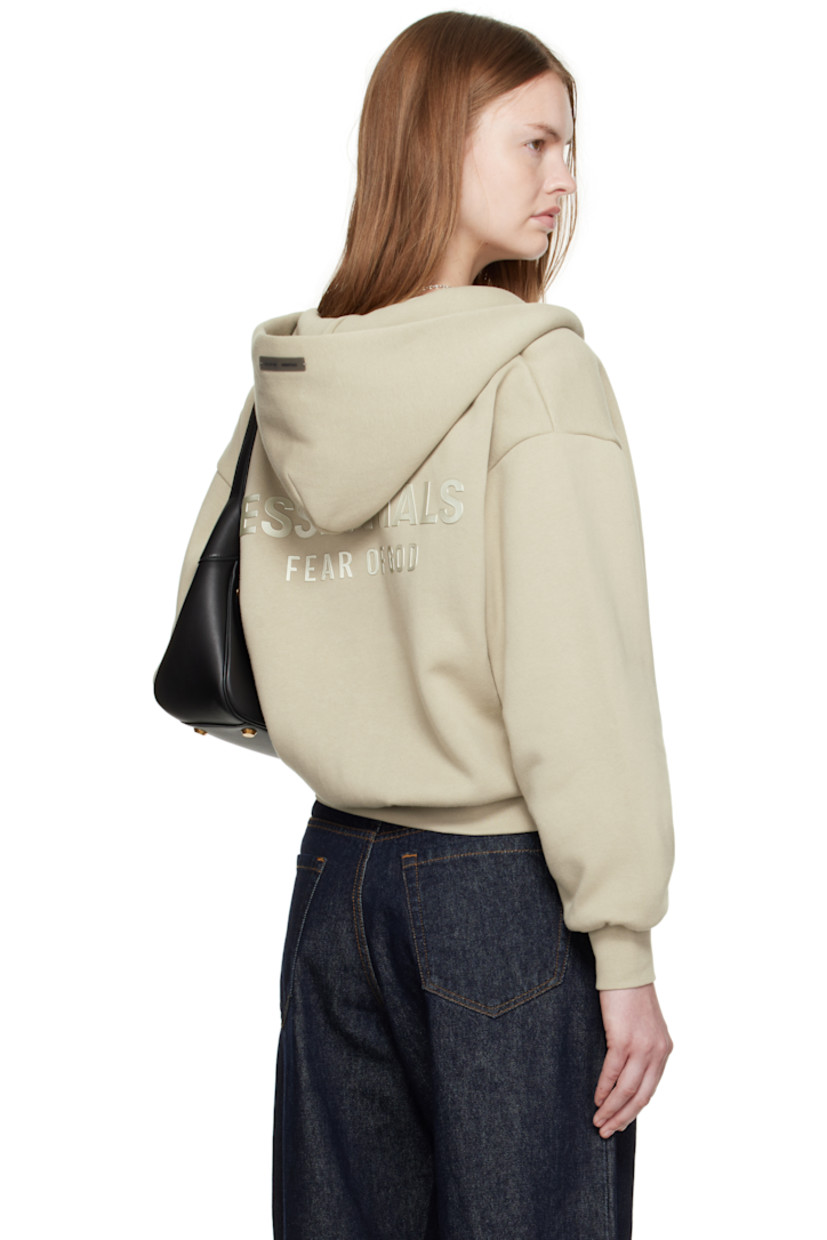 Cotton-blend fleece hoodie. 

· Rubber logo patch at hood and cuff
· Two-way zip closure
· Patch pockets at front 
· Rib-knit hem and cuffs
· Dropped shoulders
· Bonded logo at back 

Supplier color: Abbey stone